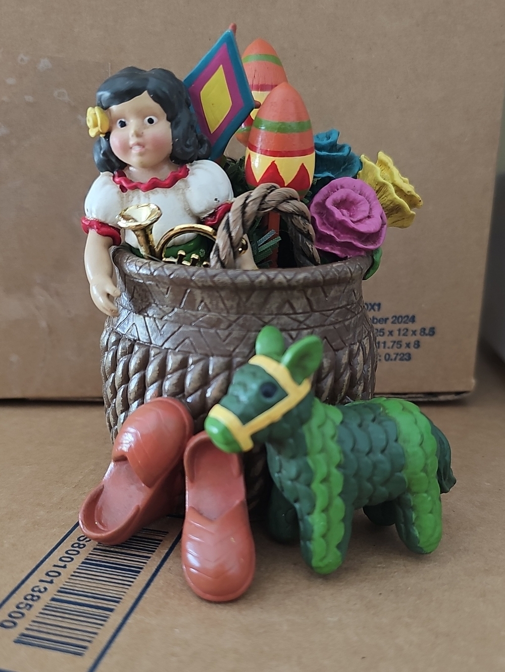 Old Mexico Souvenir girl doll with pinata, kite horn, maracas & flowers basket